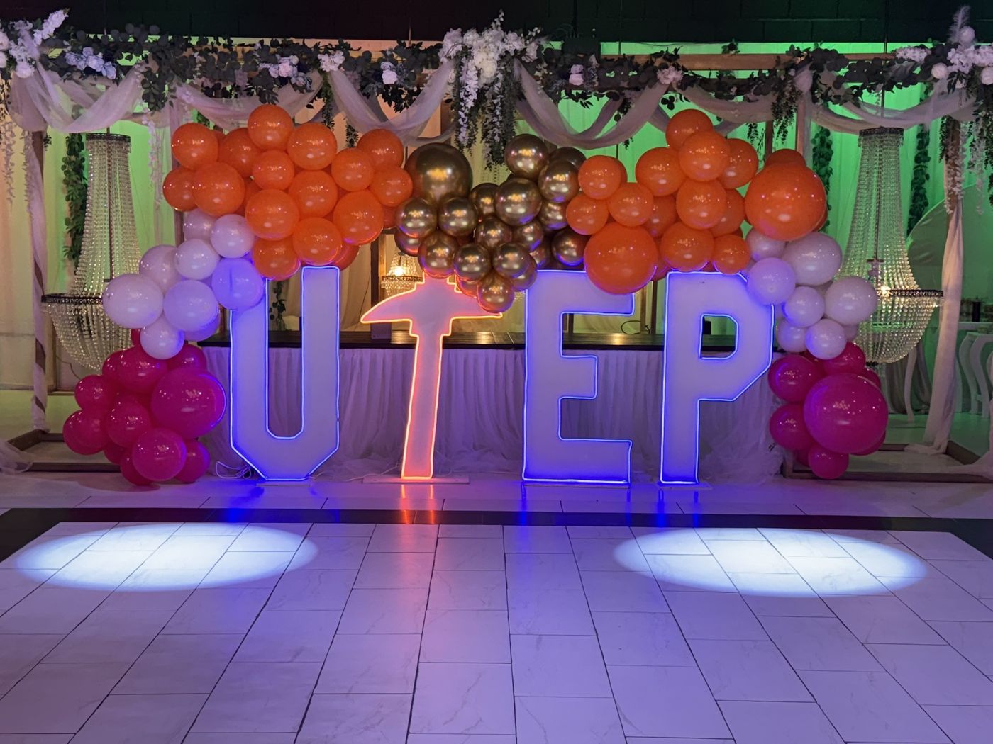 Light-up UTEP marquee letters with balloon garland