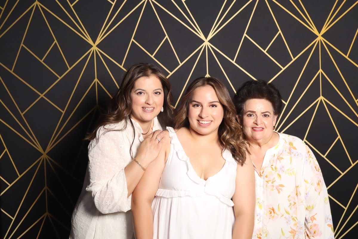Three generations of women at the JVR photo booth