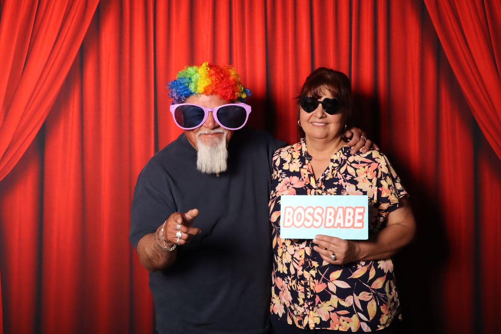 Guests having fun with photo booth props