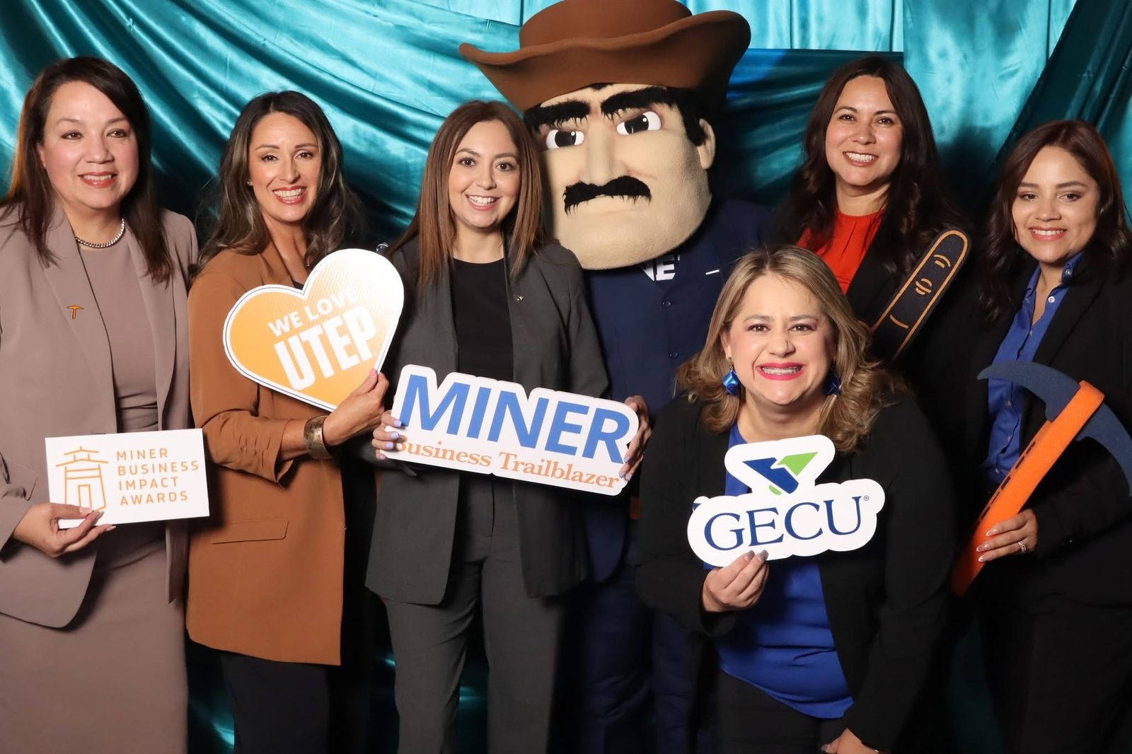 UTEP mascot with guests at the JVR photo booth